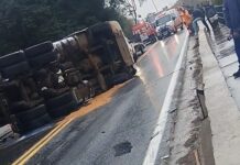 Carreta carregada de leite tomba e interdita BR-381 em Nova Era